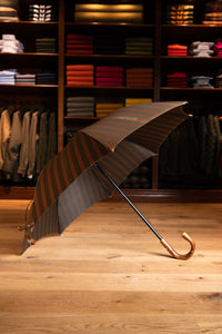 Regenschirm “Francesco Maglia” - 3er Streifen - orange auf grün